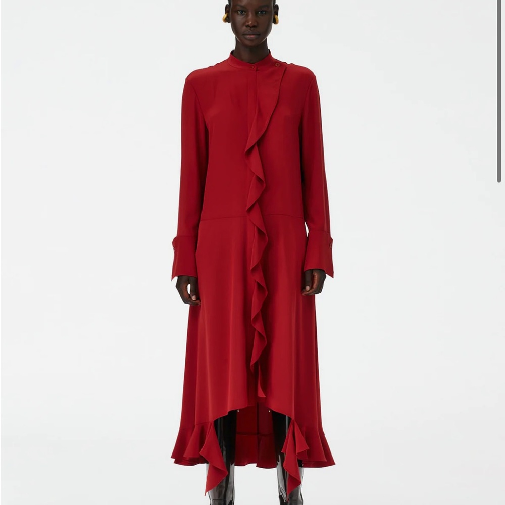 Beautiful NWT Tibi eco silk detached ruffle dress. Size 0. Color is a brick red.